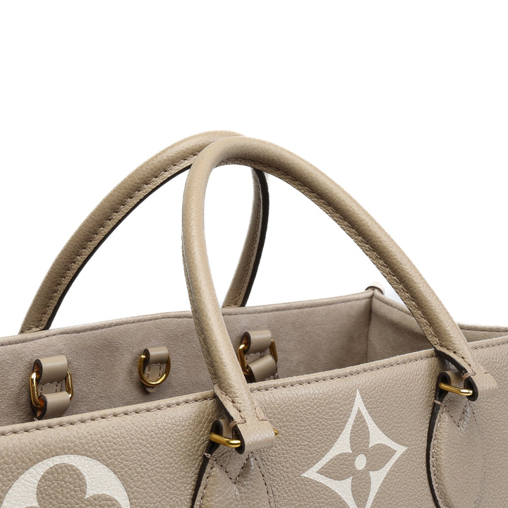 LOUIS VUITTON Bicolor Monogram Empreinte Onthego MM - Dove