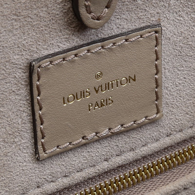 LOUIS VUITTON Bicolor Monogram Empreinte Onthego MM - Dove