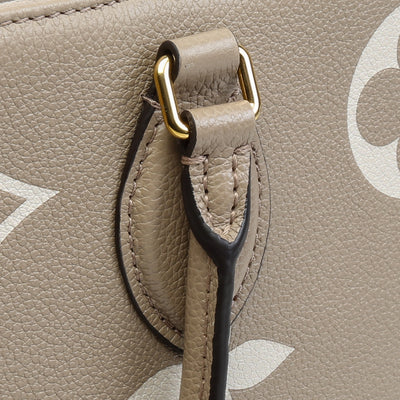 LOUIS VUITTON Bicolor Monogram Empreinte Onthego MM - Dove