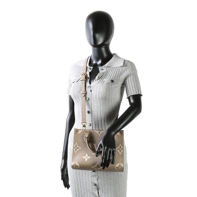 LOUIS VUITTON BiColor Monogram Empreinte OnTheGo PM - Dove/Cream