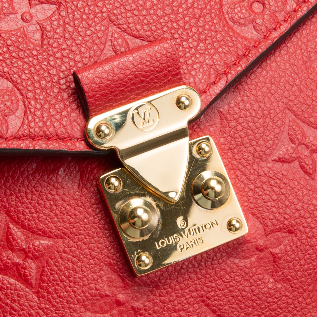 LOUIS VUITTON Monogram Empreinte Pochette Metis - Red