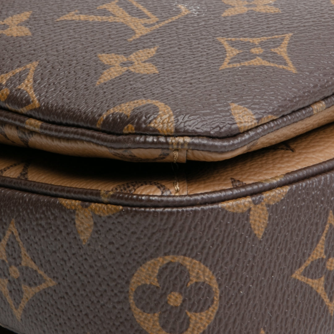 Louis Vuitton Pochette Metis Monogramm umgekehrt